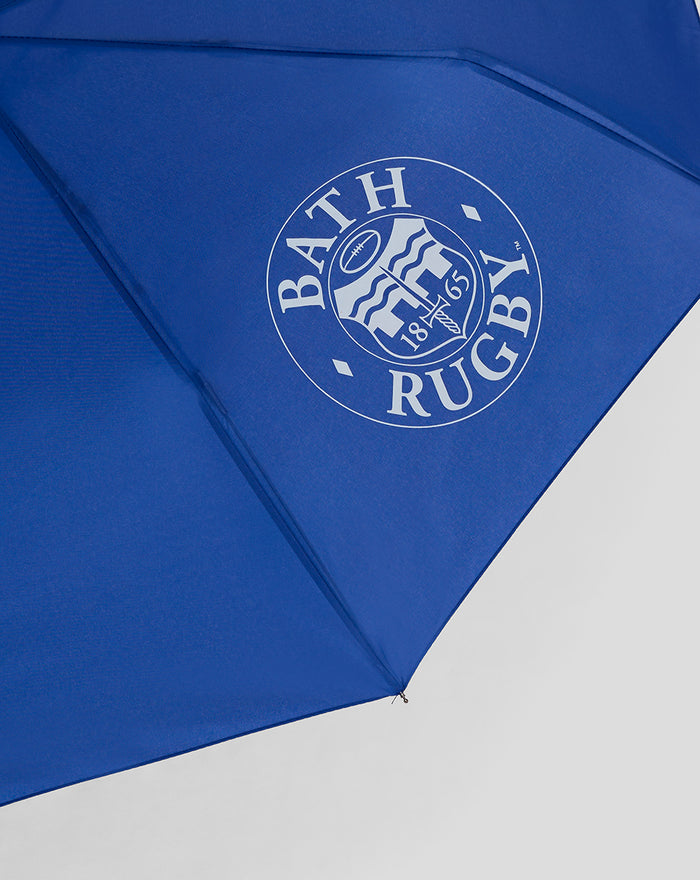 Close up of Bath Rugby crest on blue umbrella canopy