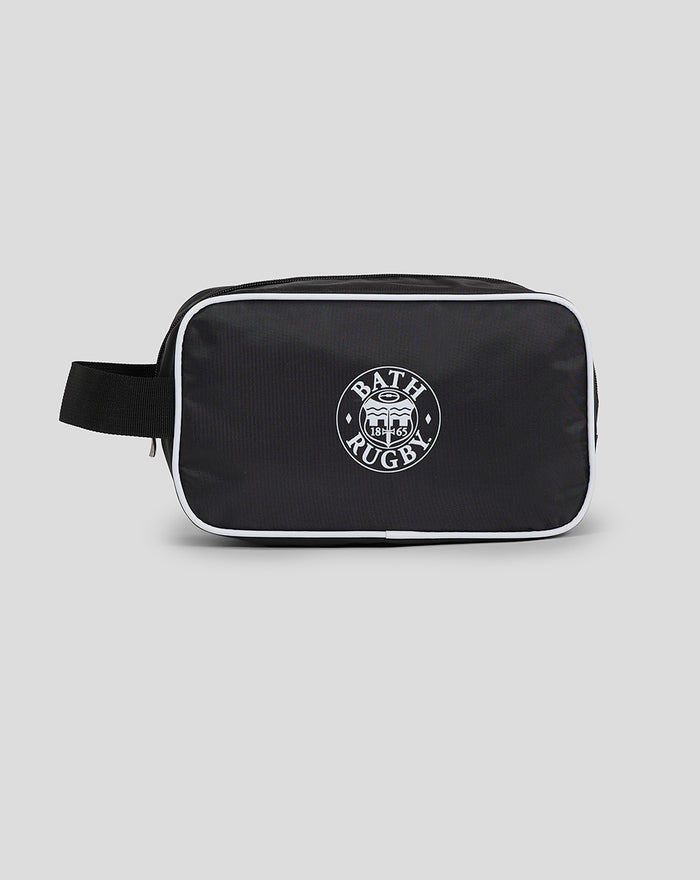 Front view of black Bath Rugby washbag with white piping and central circular logo.