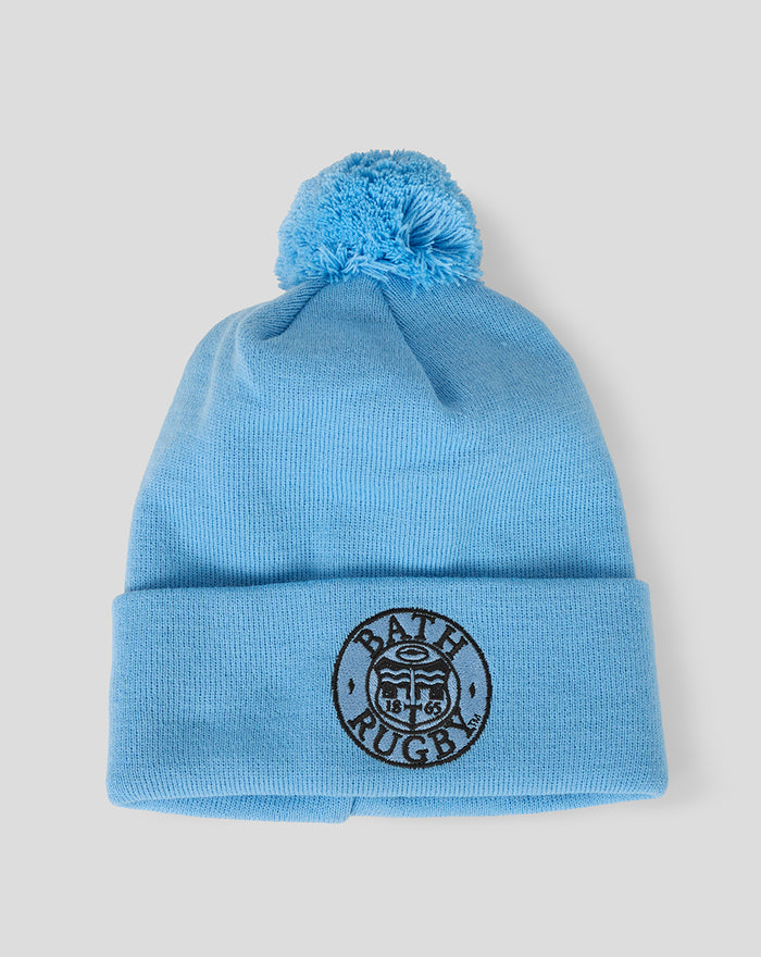 Bright light blue Bath Rugby knit beanie with pom-pom and embroidered crest on the cuff