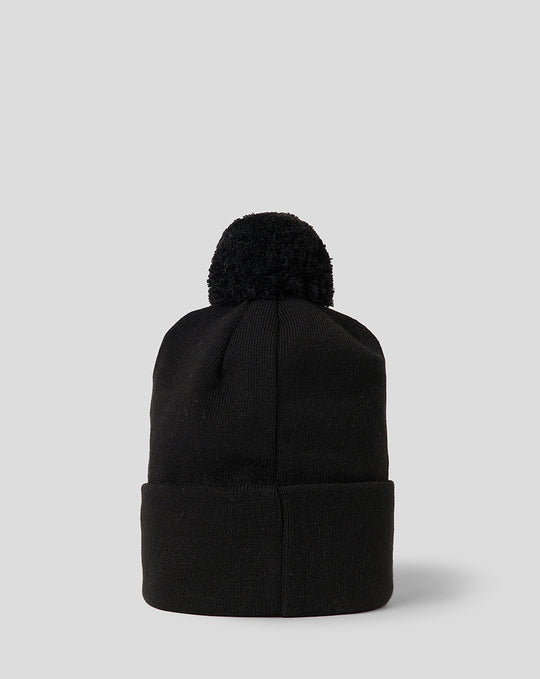 Back view of black Bath Rugby bobble hat with pom and folded cuff