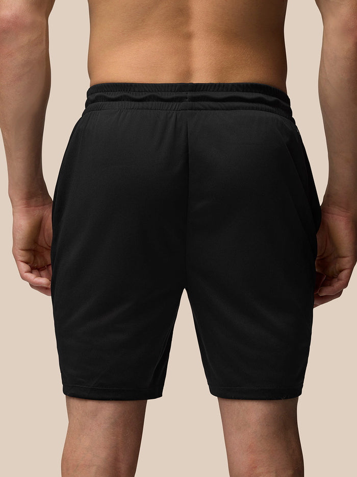Back view of black Adapt Training 7 inch shorts with elastic waistband