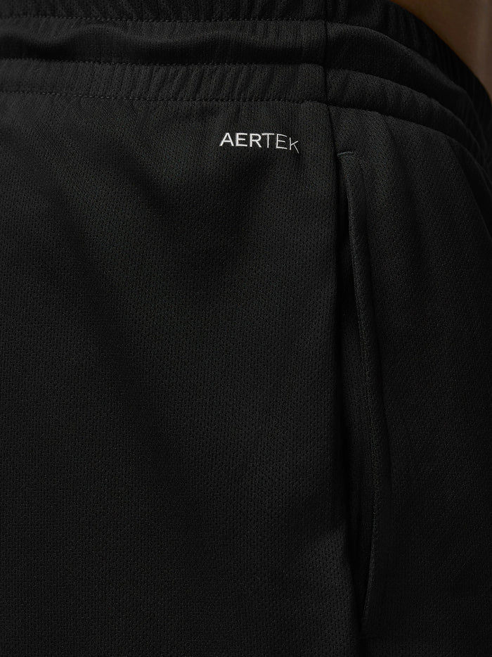 Close-up of black Adapt Training shorts waistband displaying AERTEK branding.