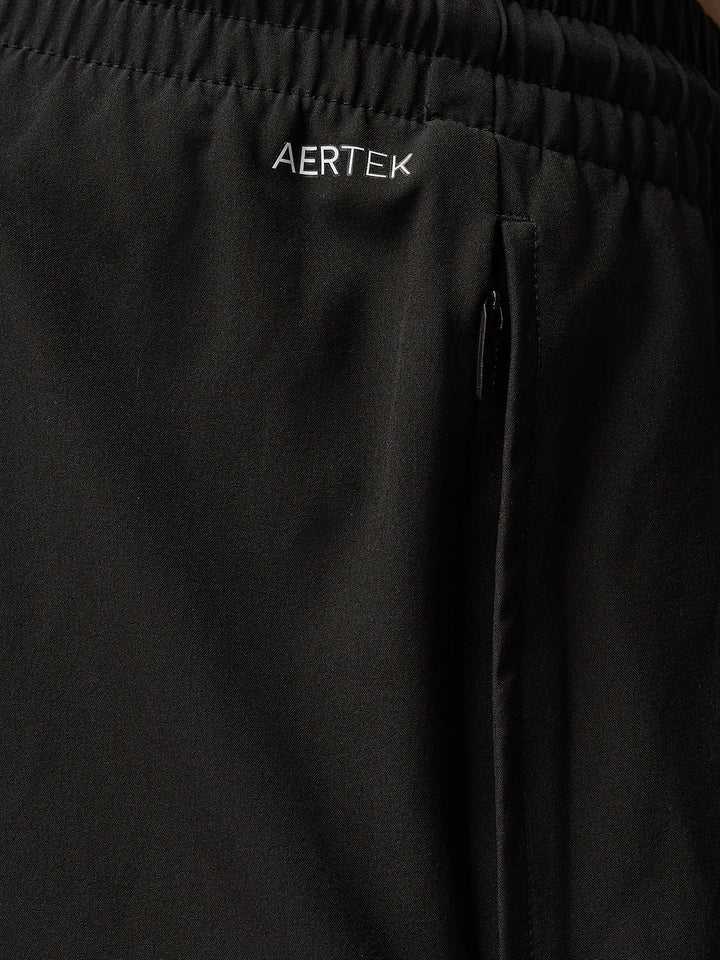Close up of black Adapt Training 6in shorts waistband featuring AERTEK branding and a side zip pocket