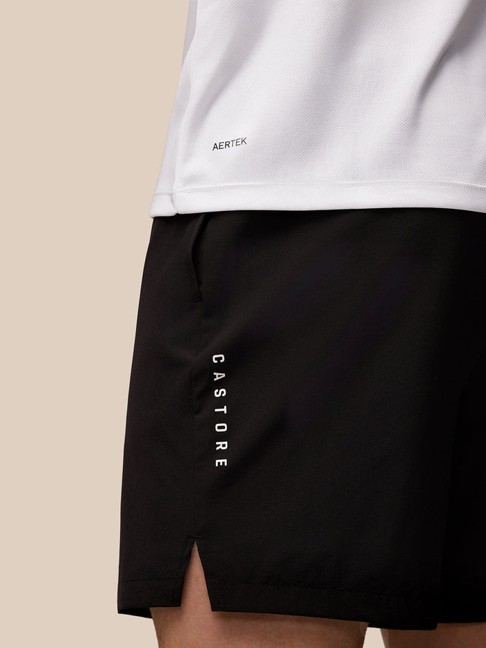 Close up of a white Adapt Training T-Shirt showing Aertek branding at the lower back.