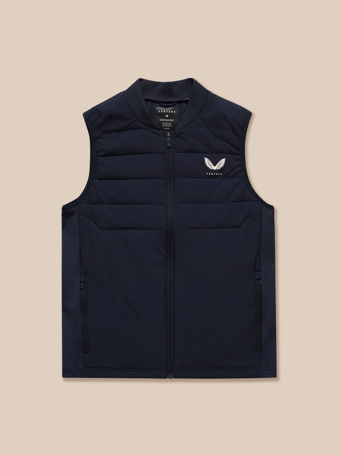 Front view of navy Apex Training Gilet on a model with zipped front and branding at chest