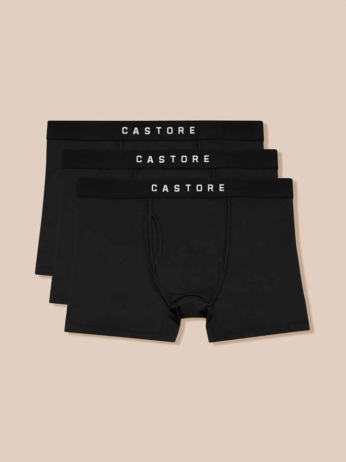 Three black Castore boxer shorts with white CASTORE waistband branding