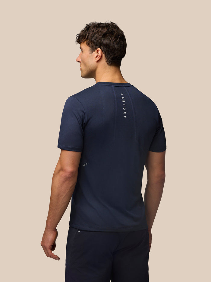 Back view of midnight navy Apex Training T-Shirt with vertical Castore branding along the upper back