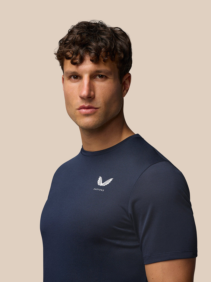 Front view of midnight navy Apex Training T-Shirt with small Castore emblem on chest