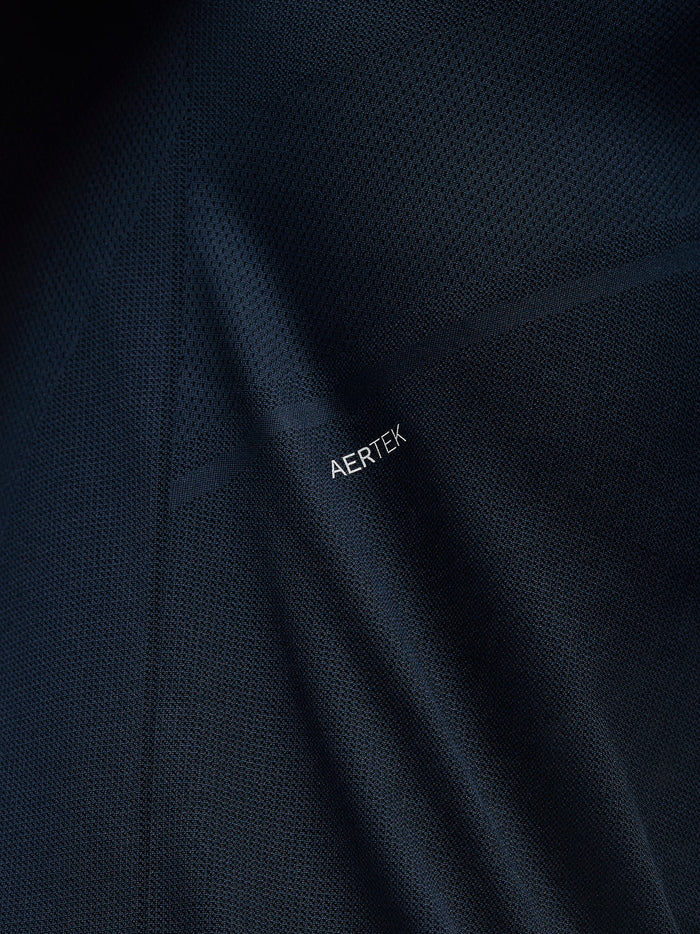Close-up of navy Apex Training T-Shirt fabric showing AERTEK branding
