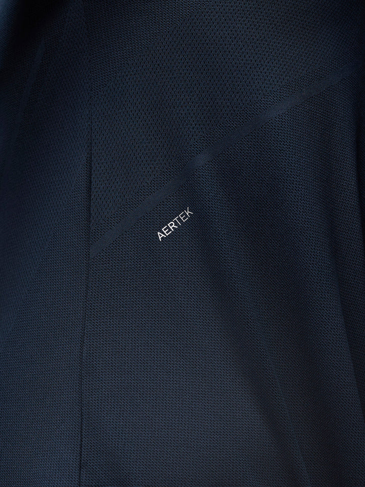 Close-up of navy mesh fabric with ARTEK branding on the Apex Training Quarter Zip Top