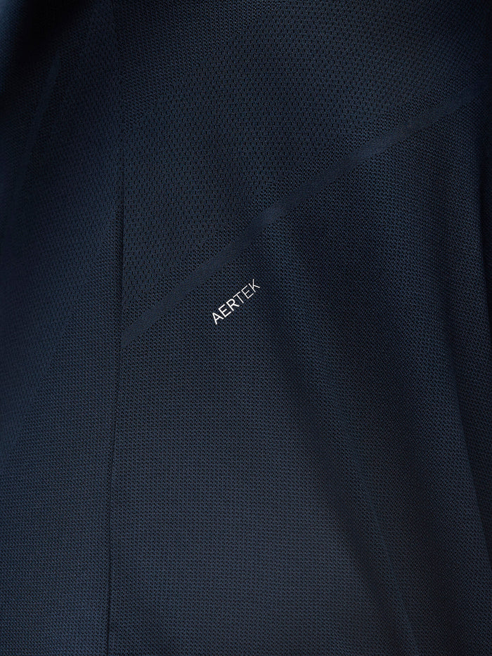 Close-up of navy mesh fabric with ARTEK branding on the Apex Training Quarter Zip Top