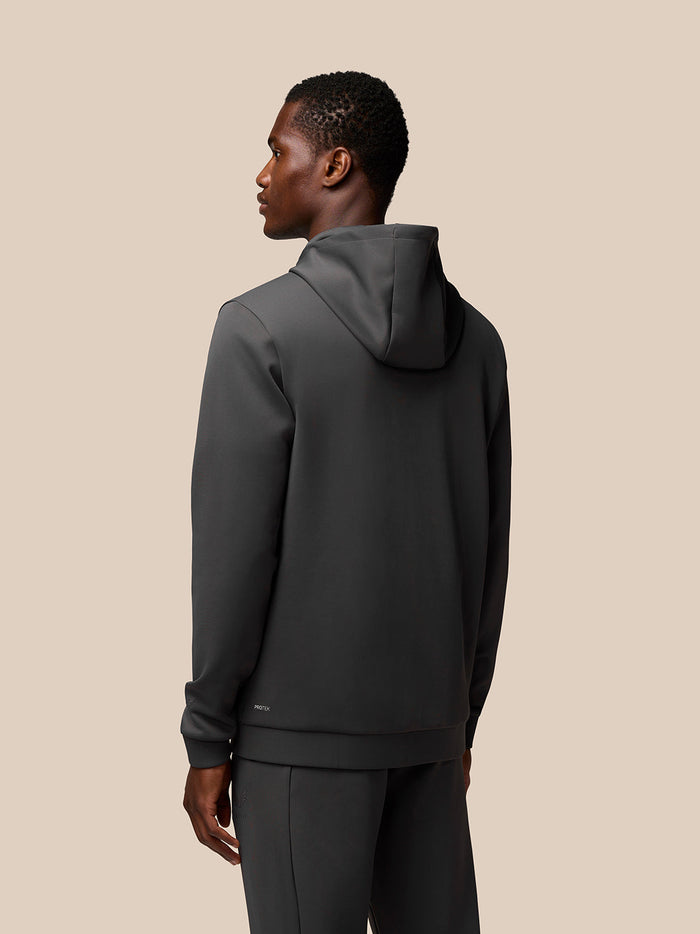 Rear view of a man wearing a charcoal Flex Lifestyle Full Zip hoodie with the hood down