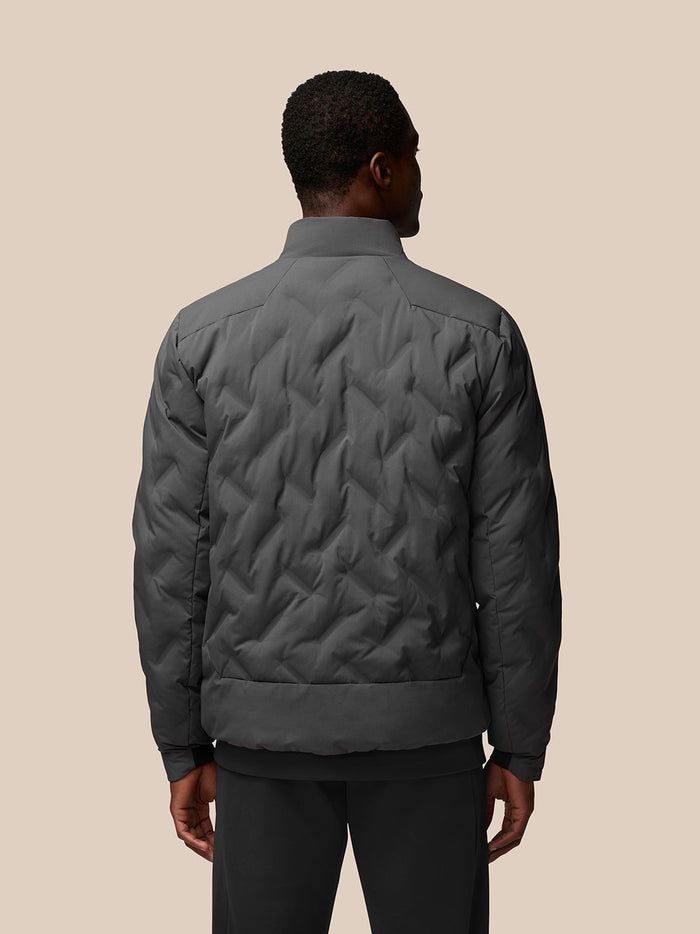 Back view of charcoal Quilts Lifestyle Jacket with diamond quilting and stand collar.