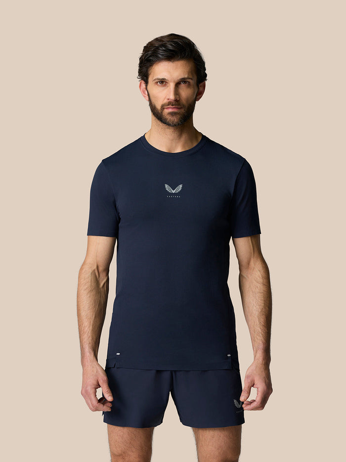 Male model wearing Zone Training T-Shirt in Midnight Navy, front view with crew neck and small chest logo.