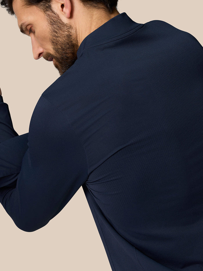 Back view of Zone Training 1/4 Zip Top in Midnight Navy highlighting a clean silhouette and athletic fit.
