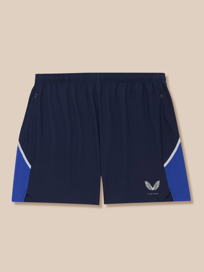Back view of navy shorts with elastic waistband and zip pocket, Castore wing logo near the hem