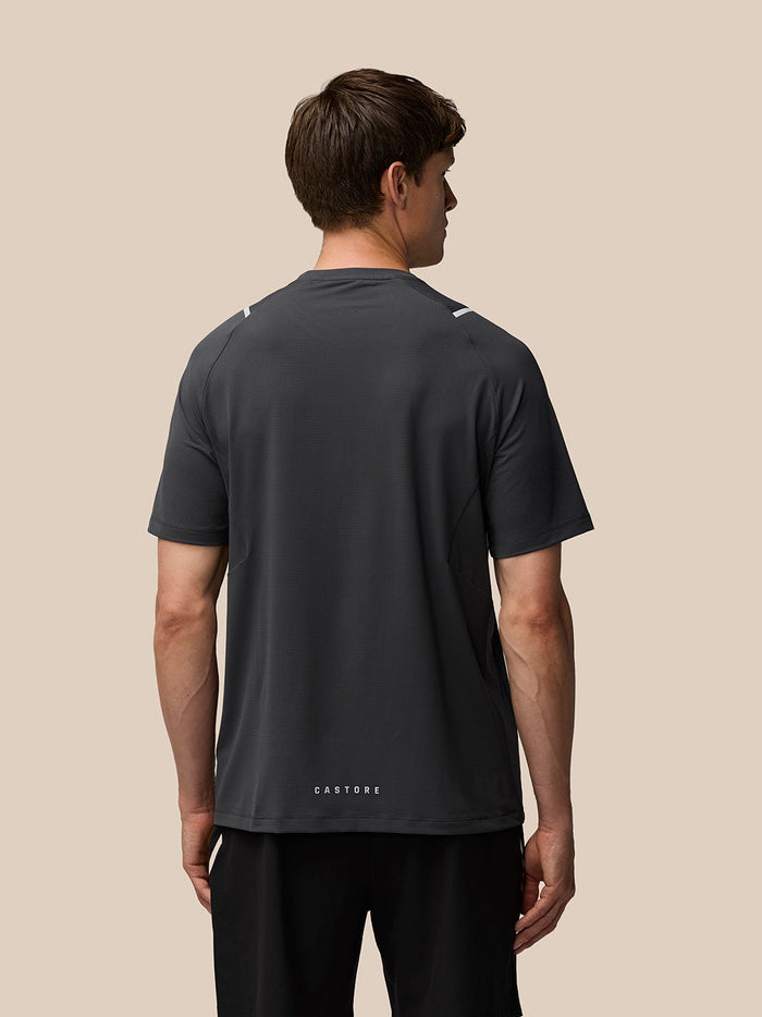 Back view of Apex Short Sleeve T Shirt Gunmetal with reflective shoulder hits and Castore wordmark at back hem