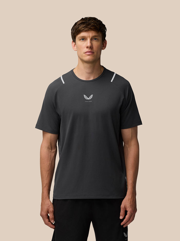 Front view of Apex Training T Shirt Gunmetal with reflective shoulder hits and Castore logo on chest
