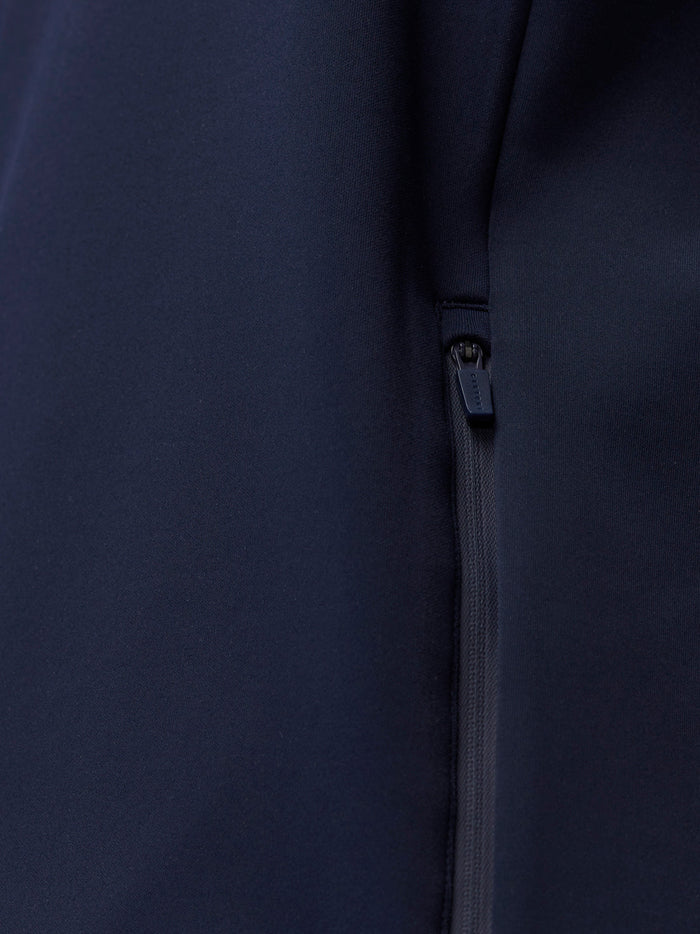 Close-up of navy Flex Thermo Hoodie side zip pocket with logoed zipper pull