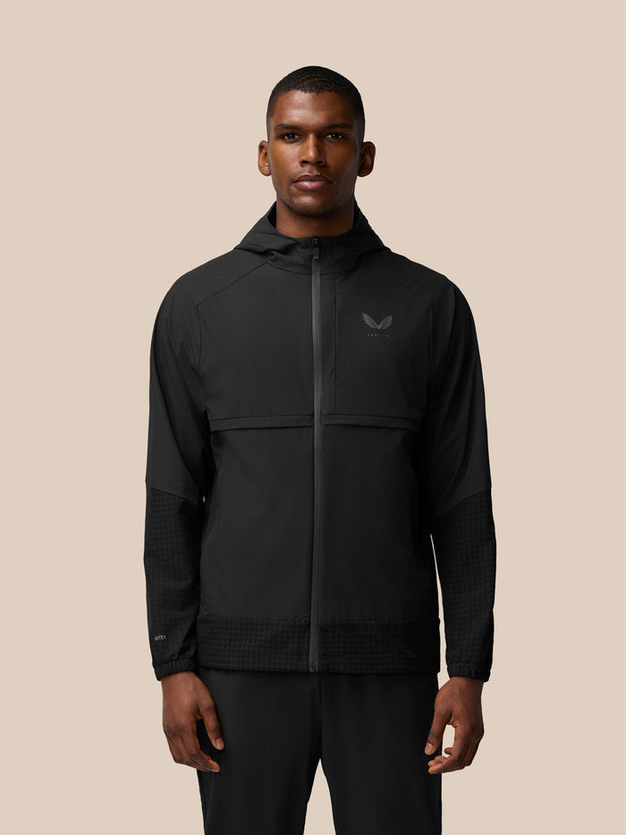 Front view of black Flex Winterised Woven Jacket with zip front ProTek finish and left chest Castore logo