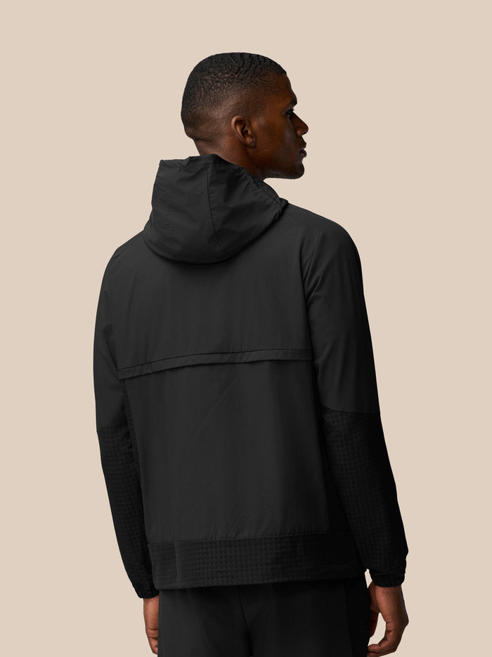 Back view of black Flex Winterised Woven Jacket with hood