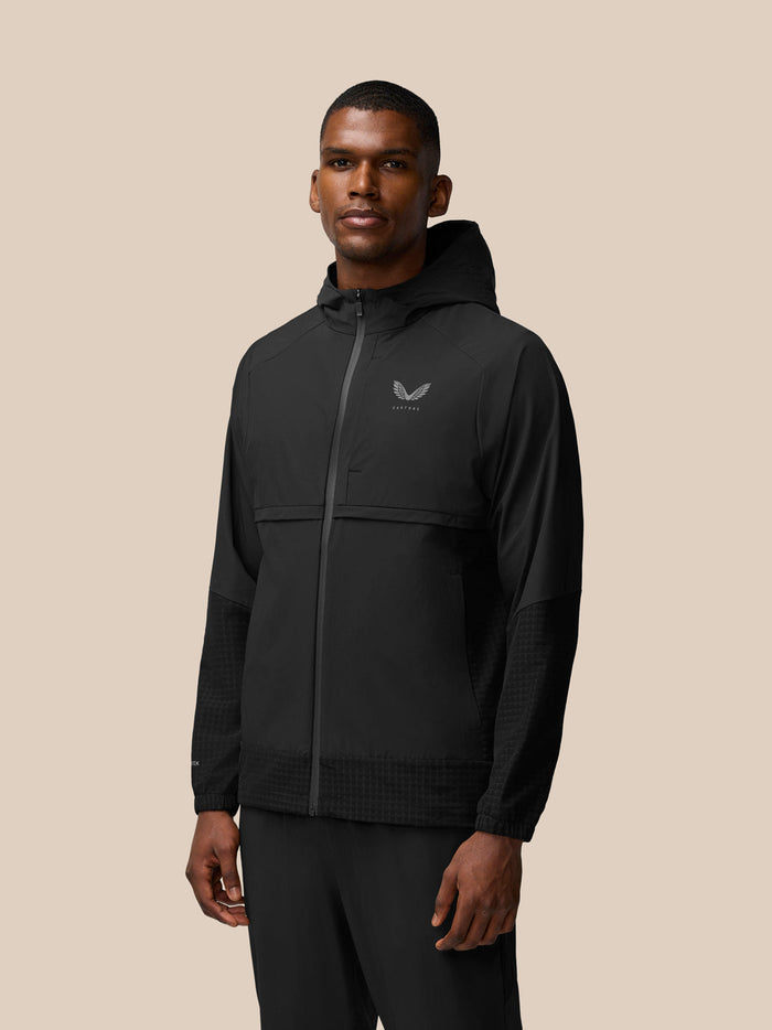 Front view of the hooded black Flex Winterised Woven Jacket with zip front and left chest Castore logo