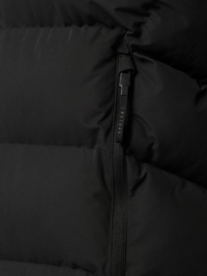 Detail of the black Puffer Gilet zipper and stitching details on fabric