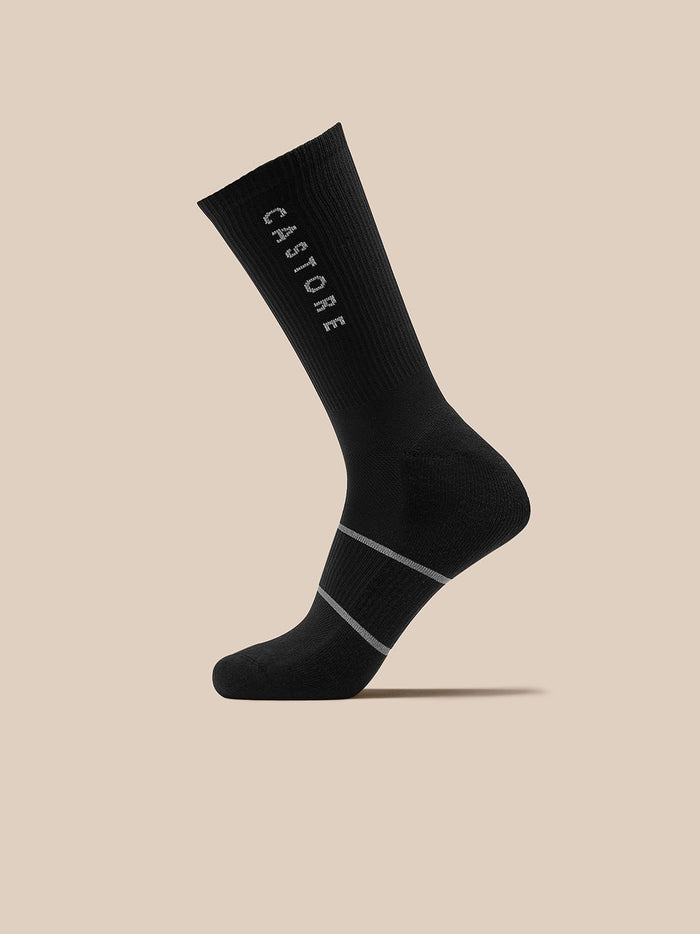 Castore Active 3 Pack Crew Sock in black with vertical logo and light gray ankle stripes.