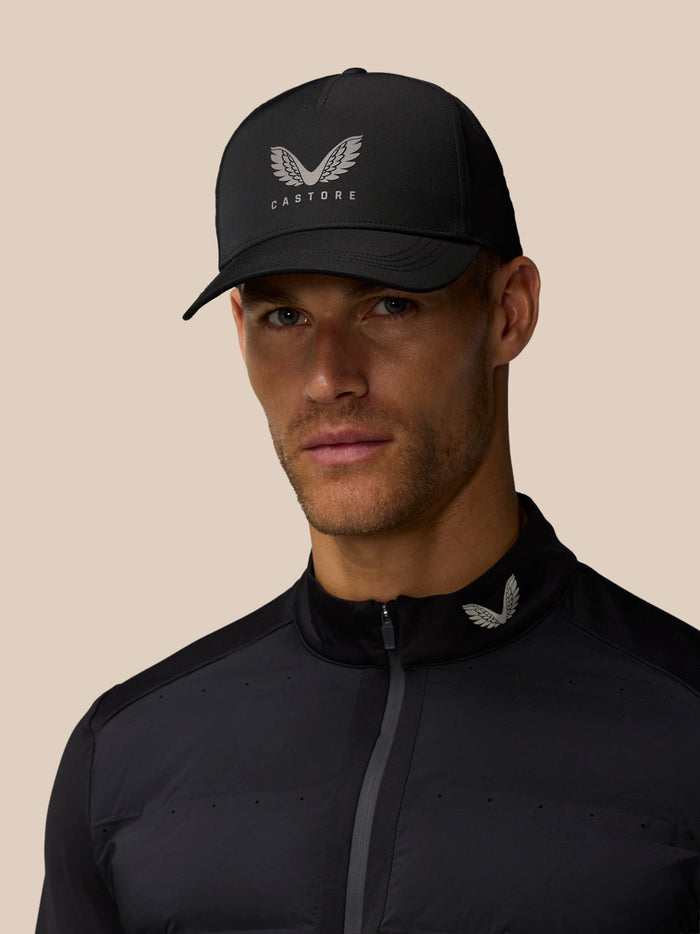 Unisex black nylon cap with Castore branding halo eyelets and adjustable back strap