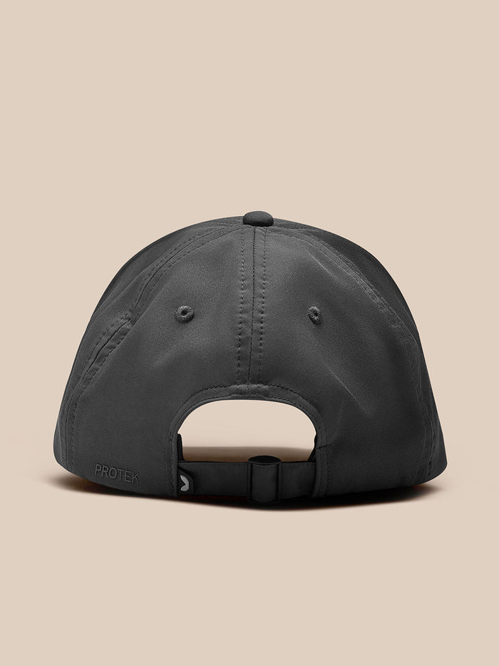 Back view of charcoal cap with adjustable strap and buckle closure