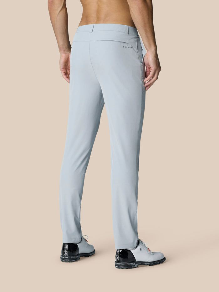 Back view close up of light grey Golf Club Trousers highlighting back pocket and branding.