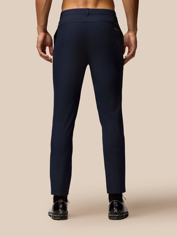 Back view of midnight navy Golf Club Trousers 32 inch leg with welt pocket and Castore branding