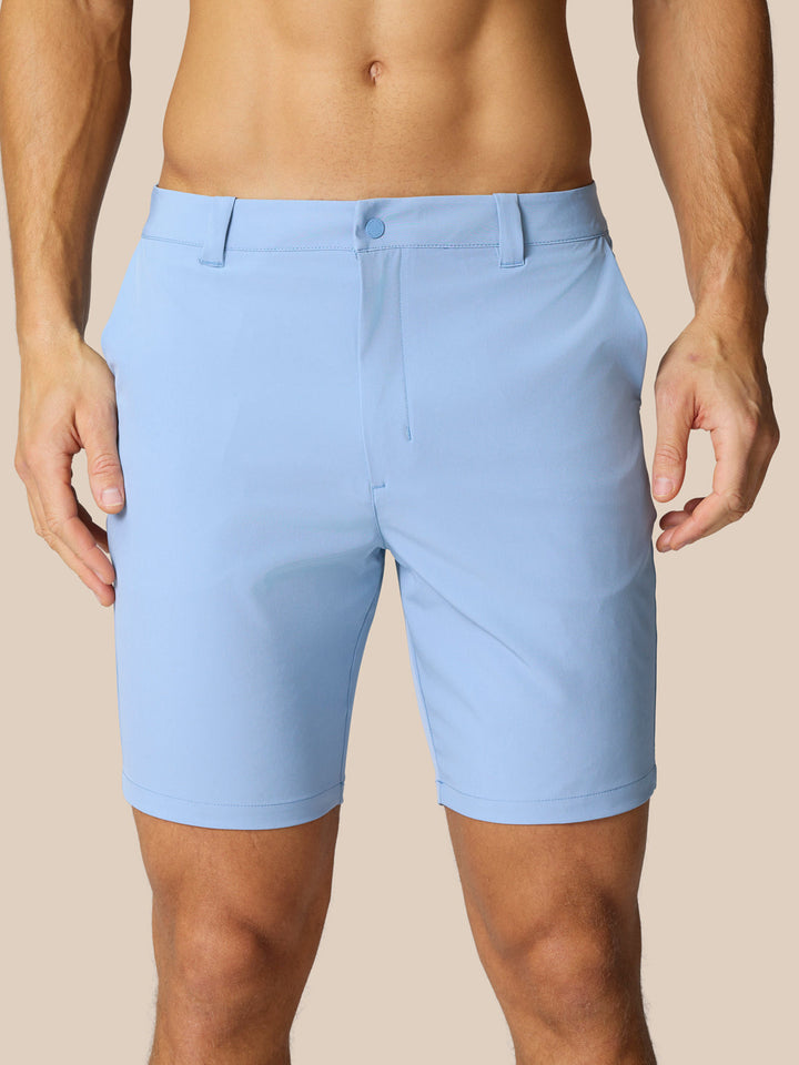 Front view of sky blue golf shorts with belt loops and side pockets.