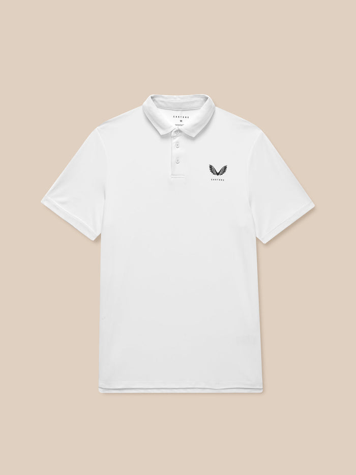Front view of a man in a white golf polo with three button placket and Castore logo on the chest