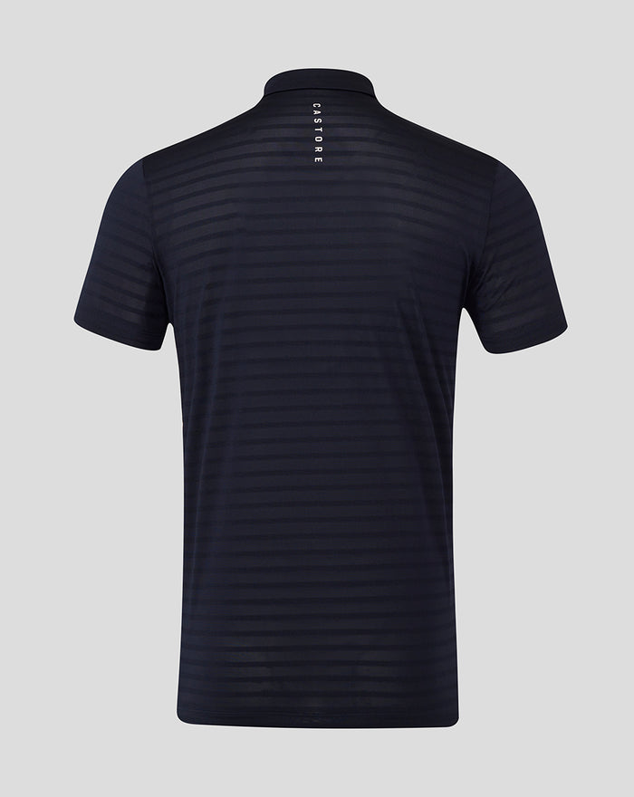 Back view of navy striped golf polo showing CASTORE branding down the spine