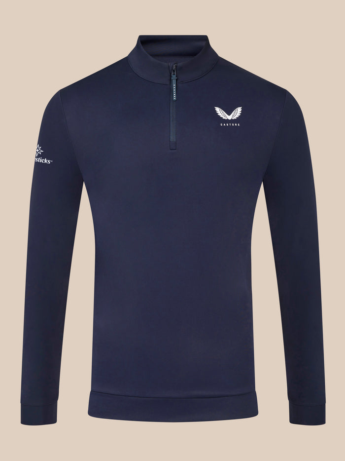 Midnight navy golf top with stand collar and quarter zip; Castore logo on the left chest.