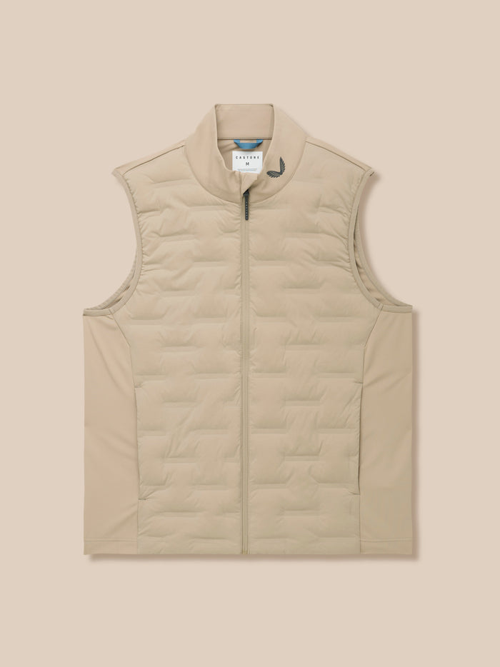 Beige mushroom Golf Pinnacle Lightweight Hybrid Gilet on a model with quilted front and center zip