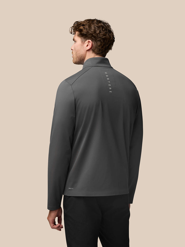 Back view of charcoal Garcia Hybrid Jacket showing vertical Castore branding along the back