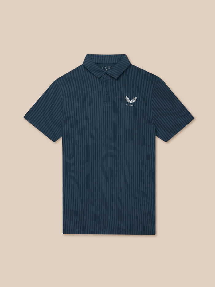 Close-up of navy striped Golf Pinnacle Glow Polo featuring the Castore logo on the left chest