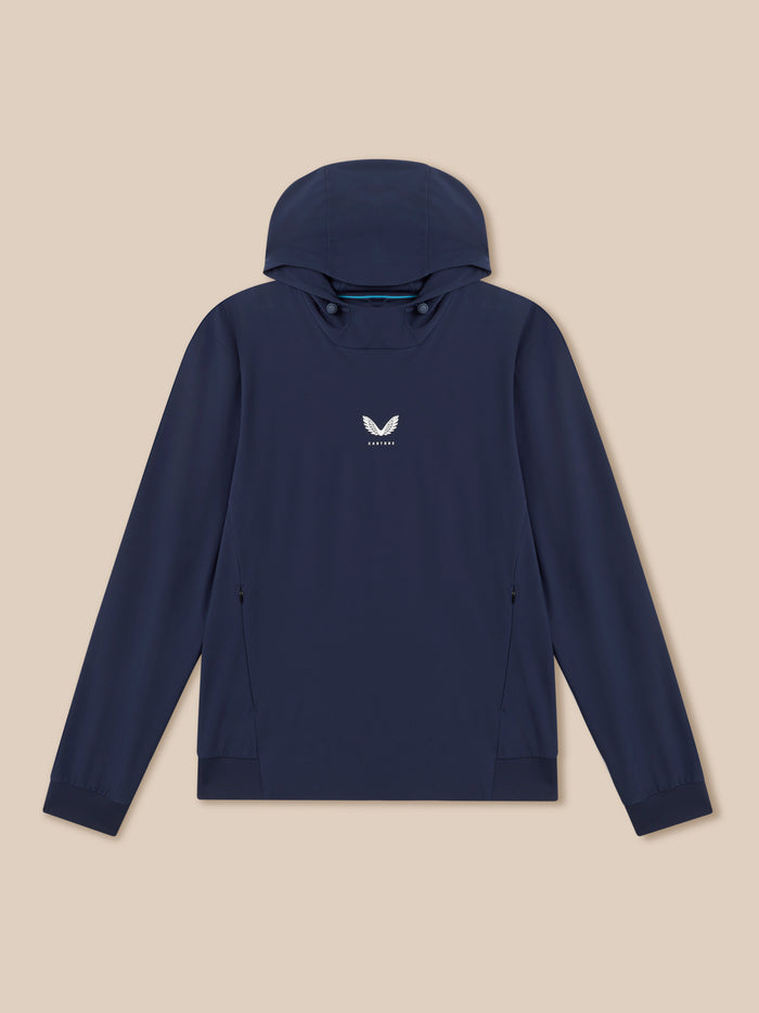 Navy hooded jacket shown from back with small Castore logo on upper back and teal trim inside the hood