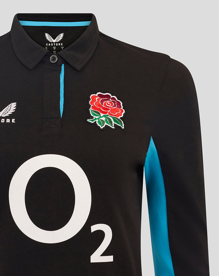 Close up of the back neck area of the black England Rugby shirt showing turquoise trim and pink cross stitch.