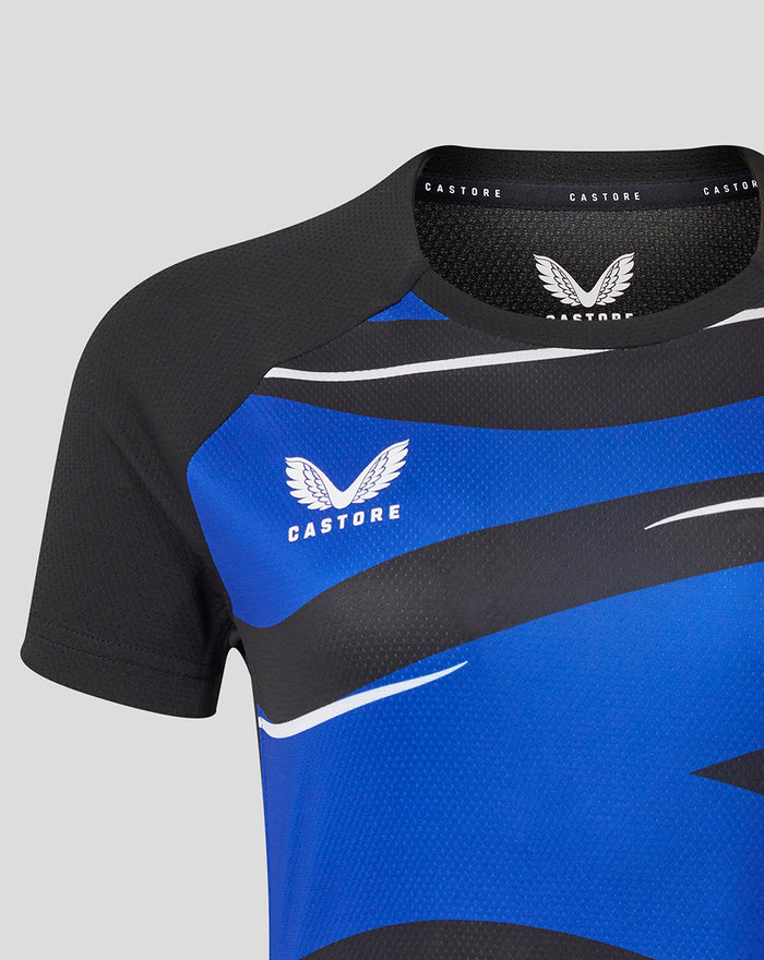Close up of neckline and left chest on Bath Rugby graphic tee showing Castore branding and bold blue black stripes.