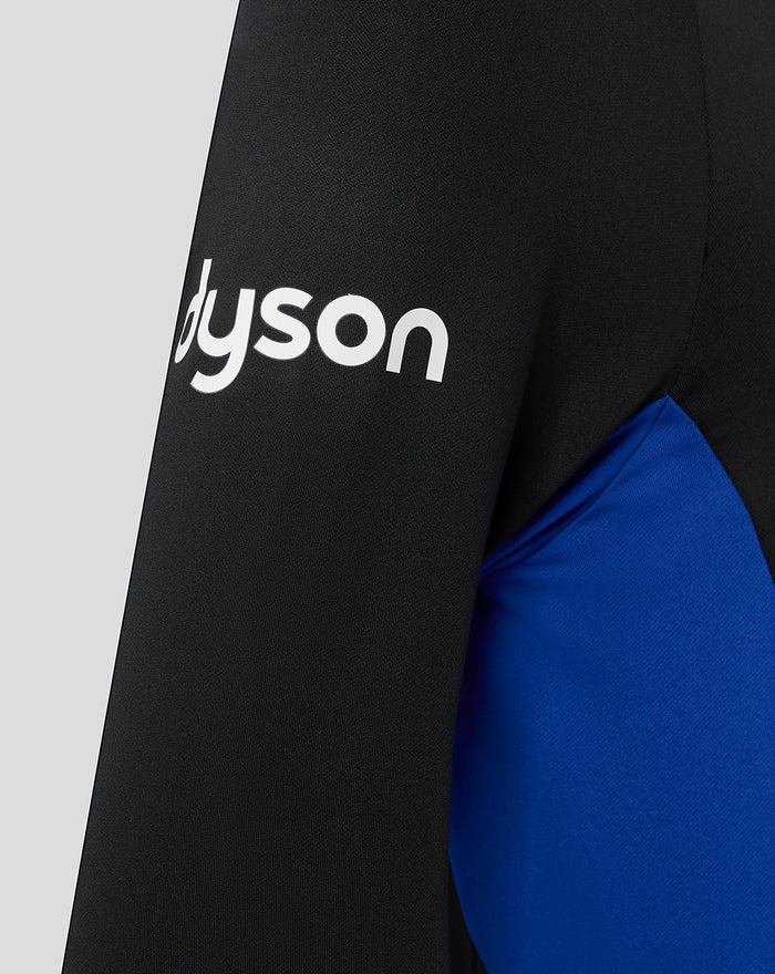 Close-up of black Bath Rugby training midlayer sleeve with white Dyson logo and blue side panel.