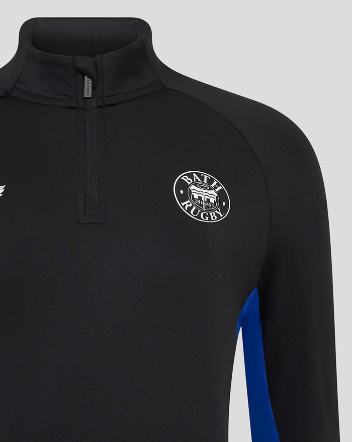 Close-up of women's Bath Rugby midlayer collar and chest with crest and half-zip placket