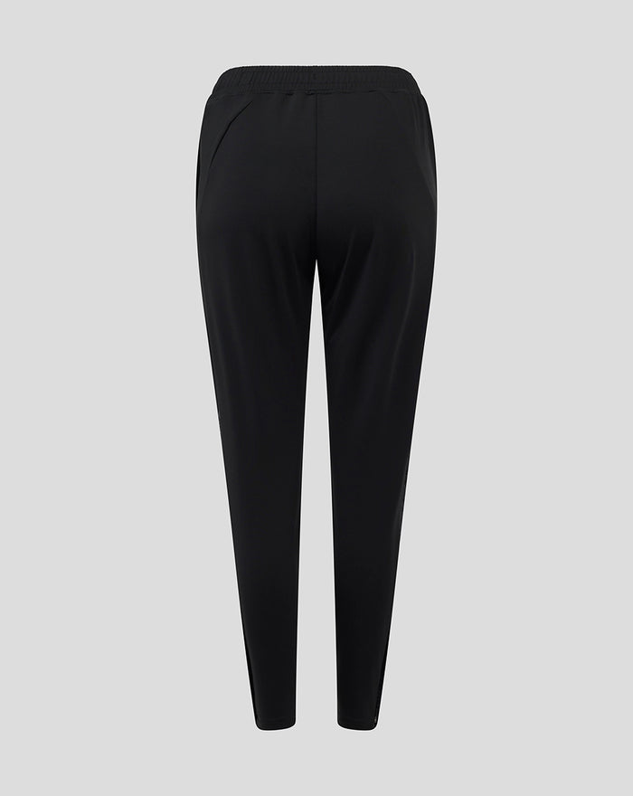 Back view of black women's Bath Rugby training knit pants with an elastic waistband.