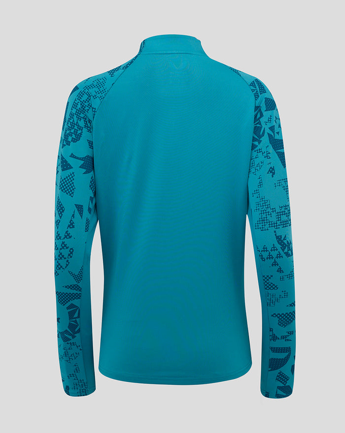 Back view of storm blue Women's England Rugby performance long sleeve midlayer top showing abstract sleeve print and solid body.