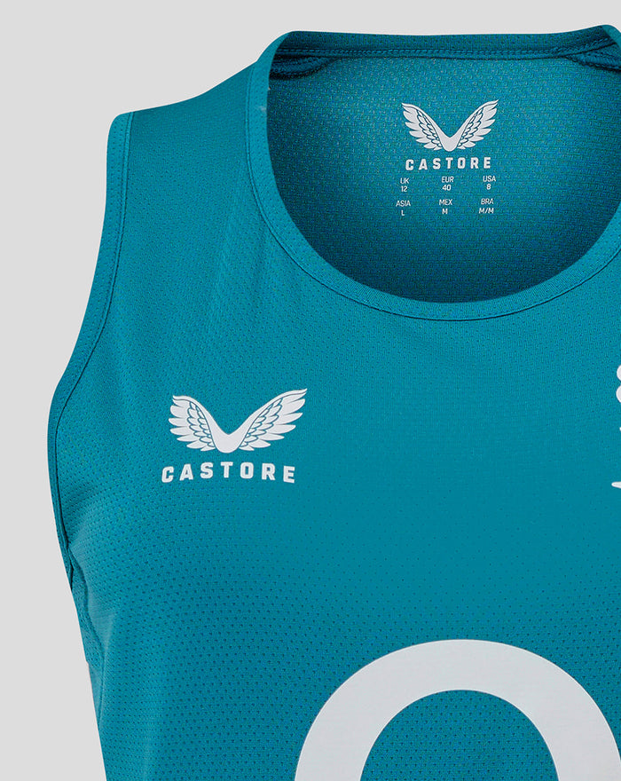 Close-up of collar area on storm blue England Rugby sleeveless jersey showing Castore branding inside neck with textured fabric