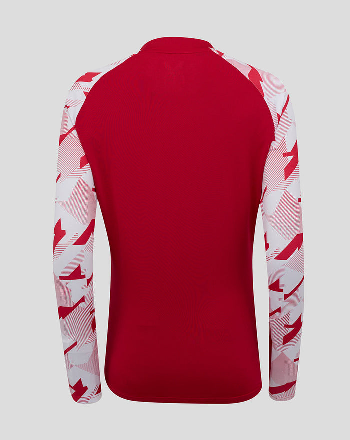 Back view of red England Rugby Red Roses pre match long sleeve drill top with white geometric sleeves.