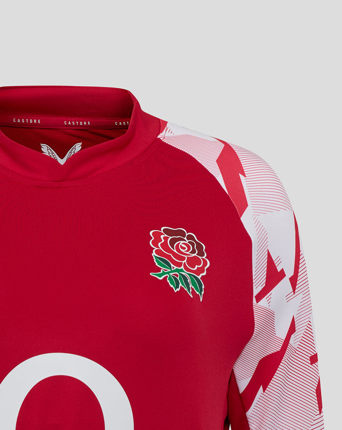Close up of red England Rugby Red Roses drill top showing the white rose crest on the chest and geometric sleeve print.