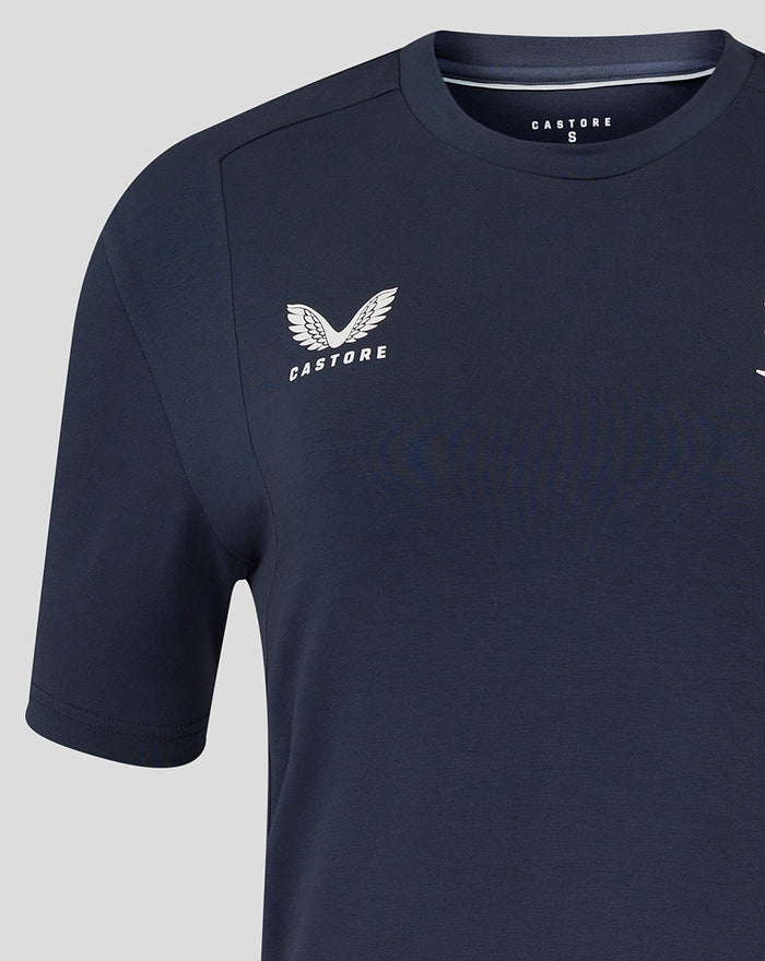 Close up of navy travel tee showing Castore logo on the chest